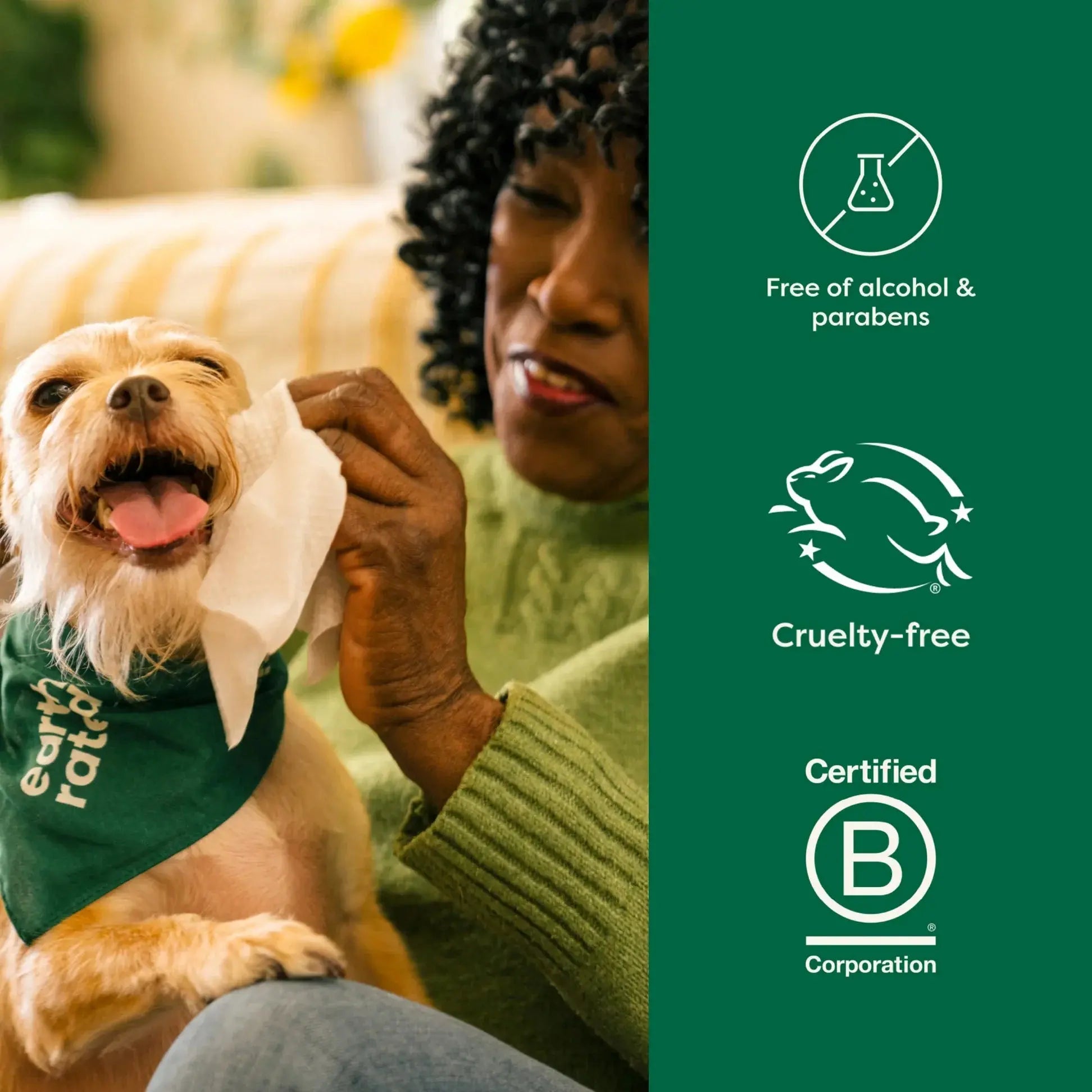 Woman gently cleaning a happy dog, showcasing cruelty-free and certified B Corporation products.