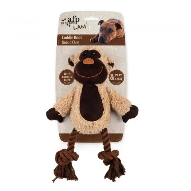 Soft monkey dog toy with knotted rope for play and cuddling.