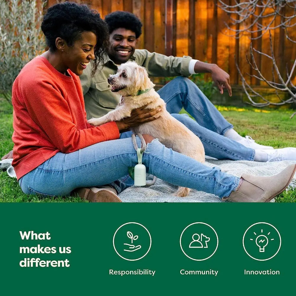 Happy couple enjoying time with their dog in a garden, showcasing love and connection.