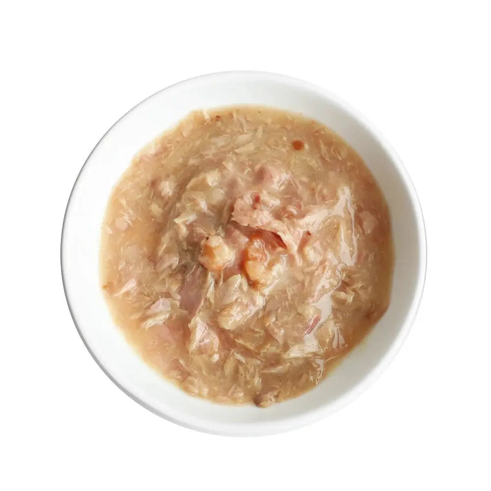 Bowl of savory fish cat food with tender chunks and rich gravy.