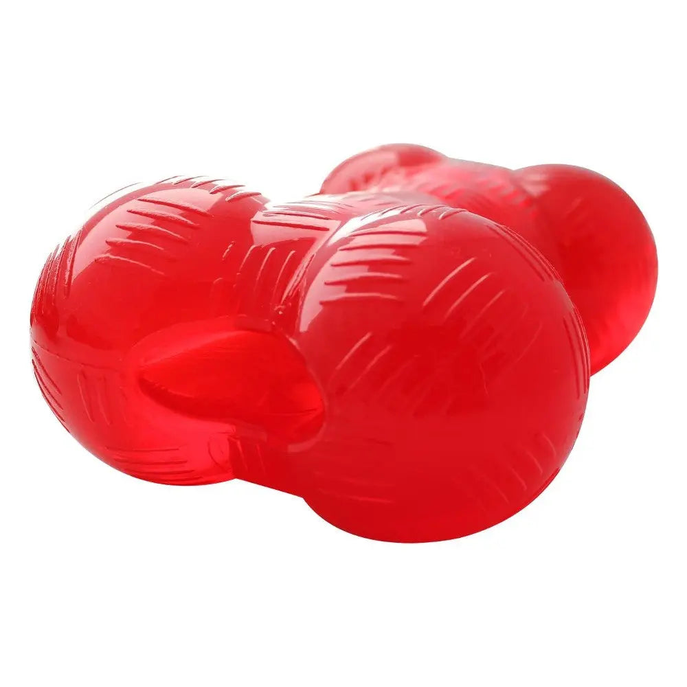 Red rubber dog toy designed for chewing and interactive play.