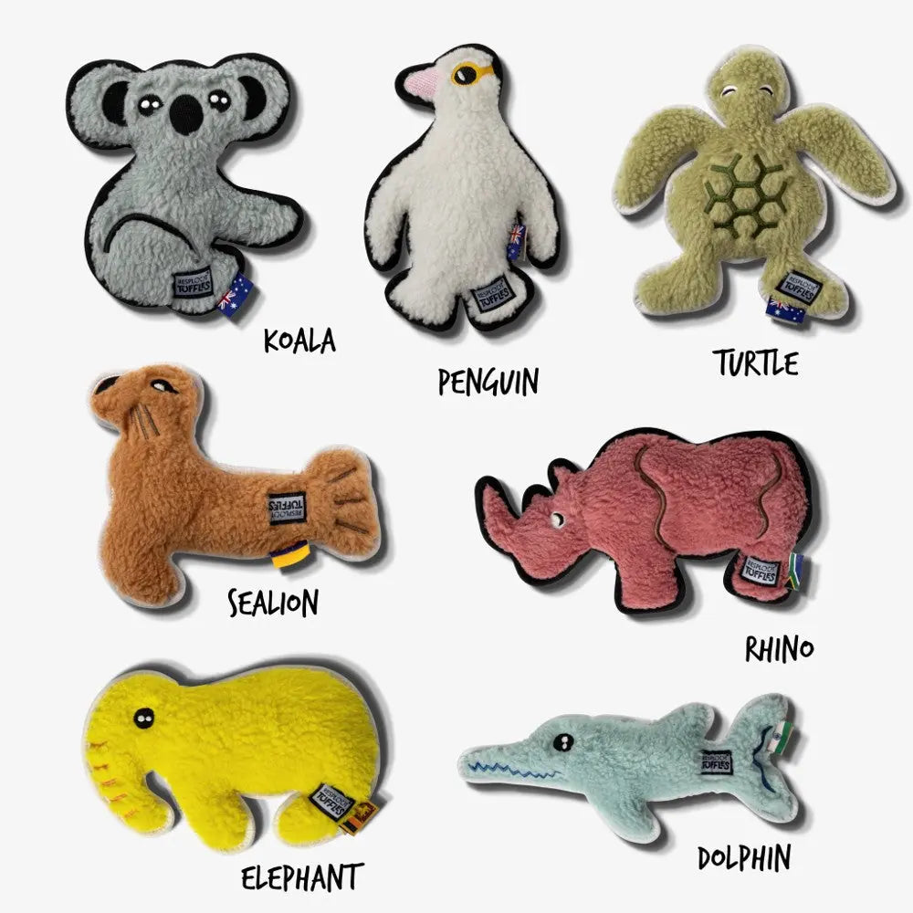 Plush animal toys including a koala, penguin, turtle, sealion, rhino, elephant, and dolphin.
