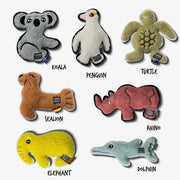 Plush animal toys including a koala, penguin, turtle, sealion, rhino, elephant, and dolphin.