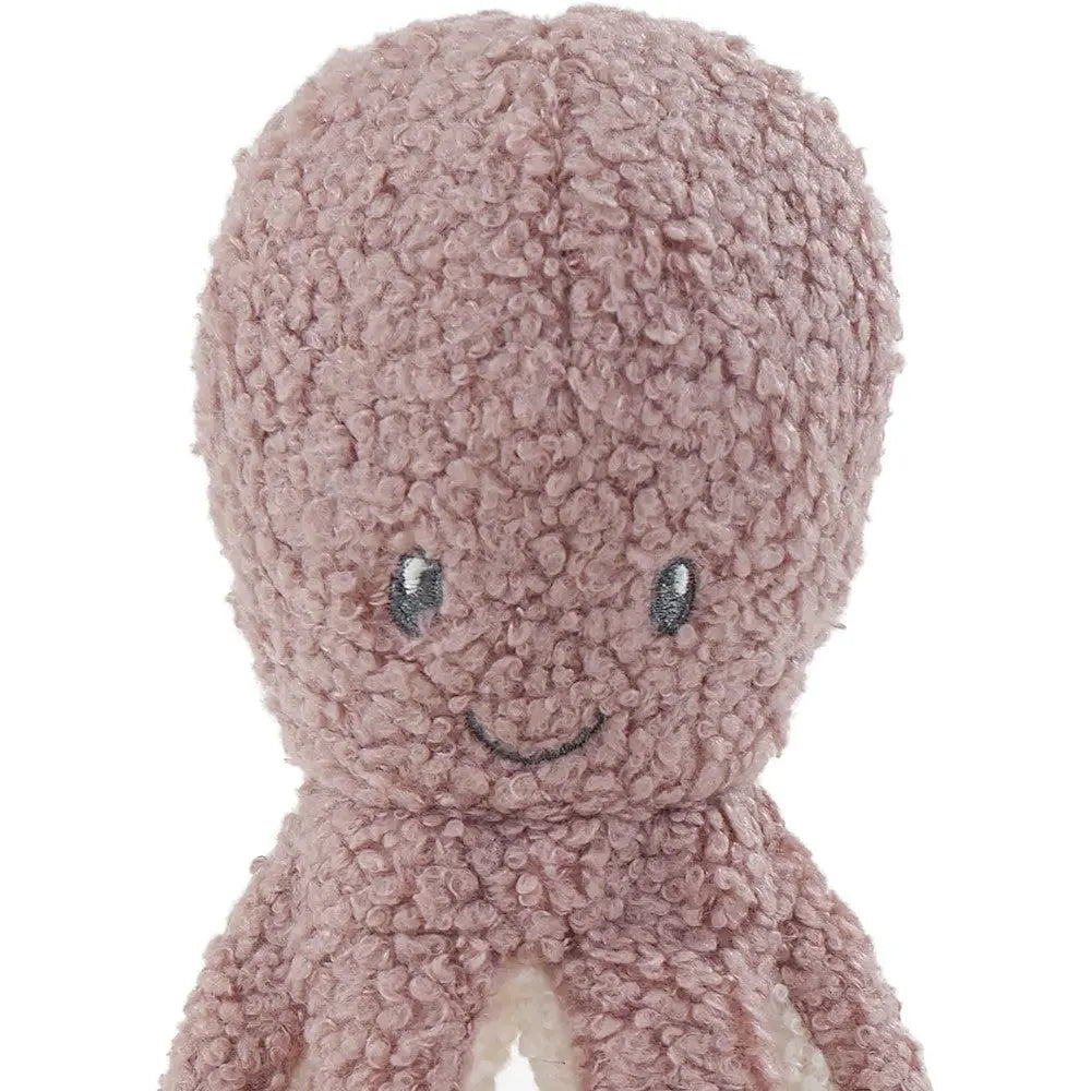 Soft plush octopus toy with a smiling face, perfect for cuddling and imaginative play.