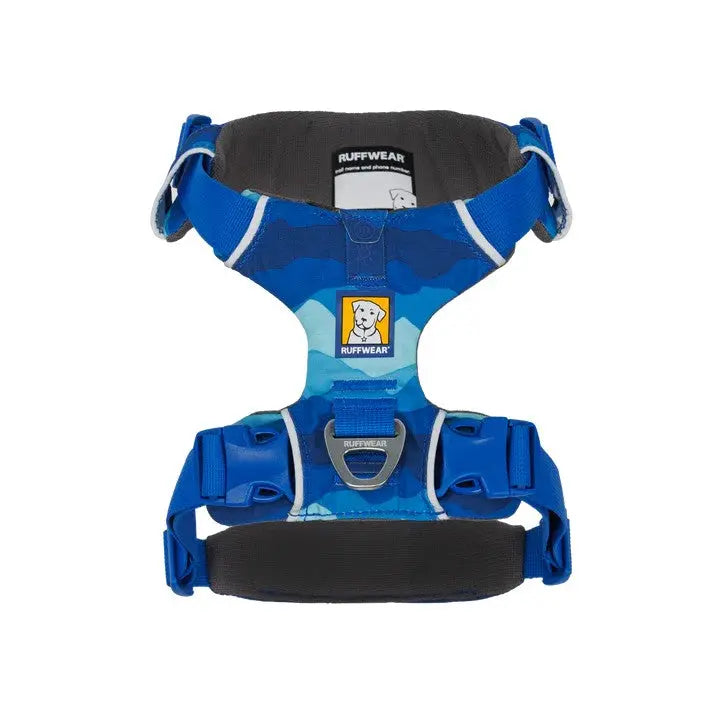 Ruffwear dog harness in blue with adjustable straps for comfort and safety during outdoor adventures.