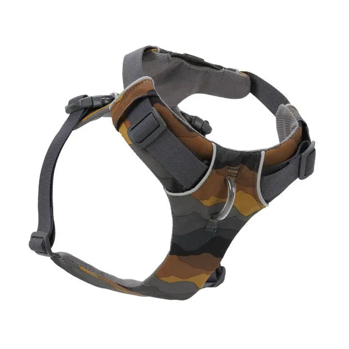 Camo-patterned dog harness designed for comfort and secure fit during walks.
