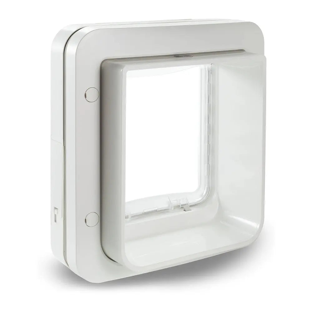 White pet door with a clear flap for easy access and convenience for pets.