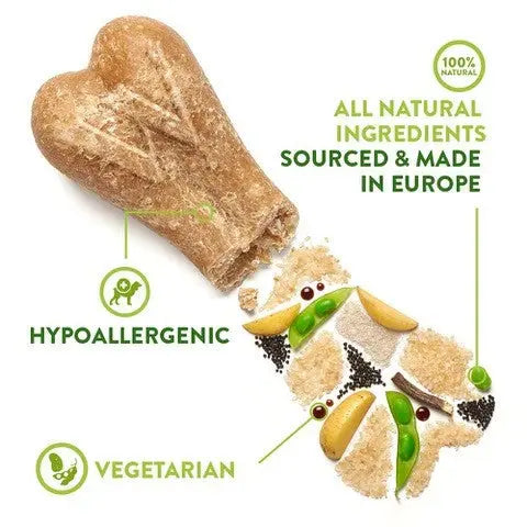 Natural dog treat shaped like a bone, highlighting hypoallergenic and vegetarian ingredients sourced in Europe.
