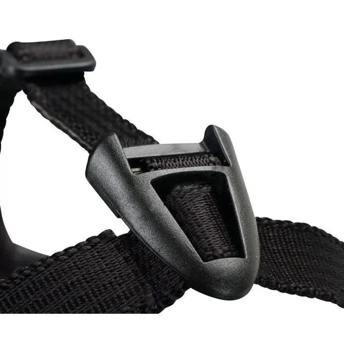 Black harness clip for secure pet restraint and adjustable fit.