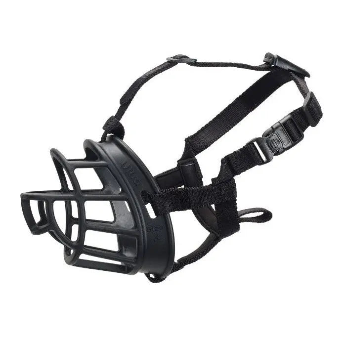 Durable dog muzzle with adjustable straps for safe and comfortable use.