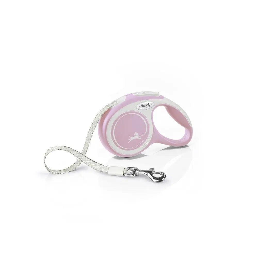 Pink retractable dog leash with ergonomic handle and durable cord for easy pet control.