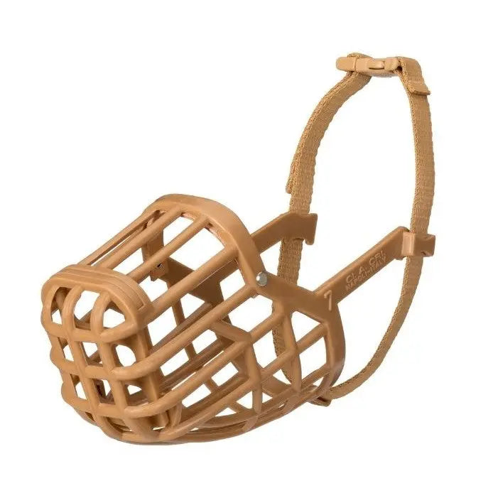 Durable dog muzzle in tan, designed for comfort and safety during training or vet visits.