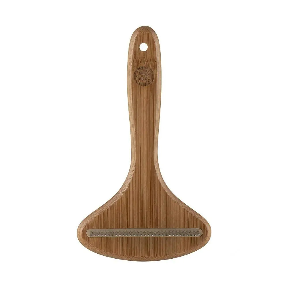 Bamboo vegetable peeler with ergonomic handle for easy and efficient peeling.