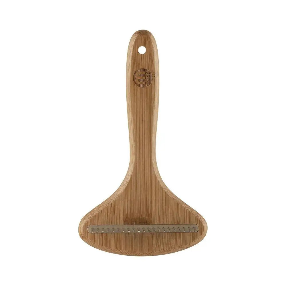 Bamboo vegetable peeler with ergonomic handle for easy and efficient peeling.