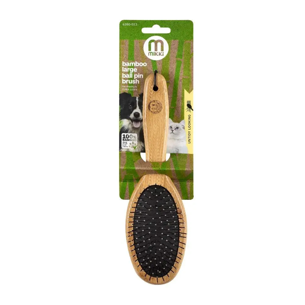 Bamboo ball pin brush for dogs, eco-friendly grooming tool with ergonomic design.