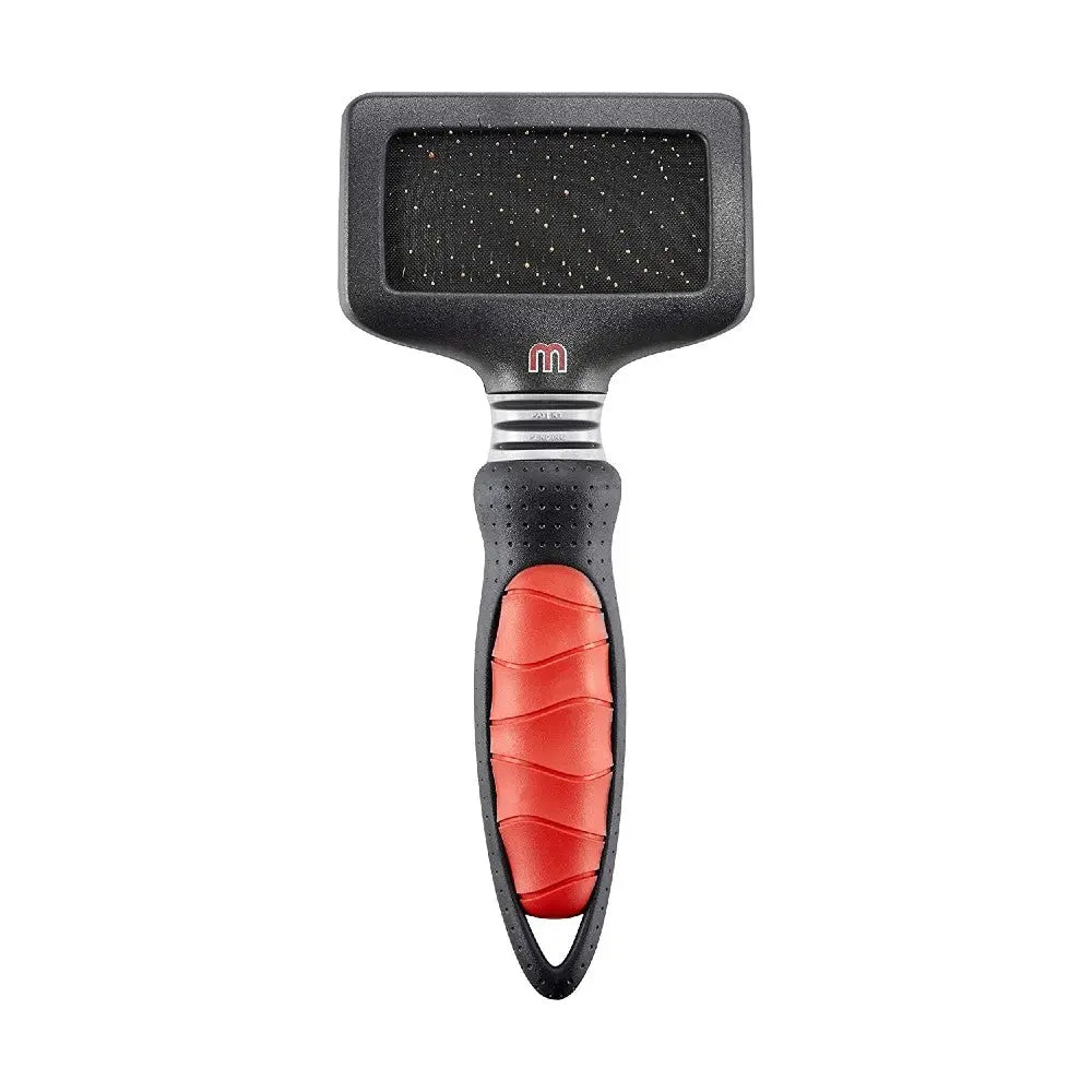 Pet grooming brush with a comfortable grip for effective fur removal and detangling.