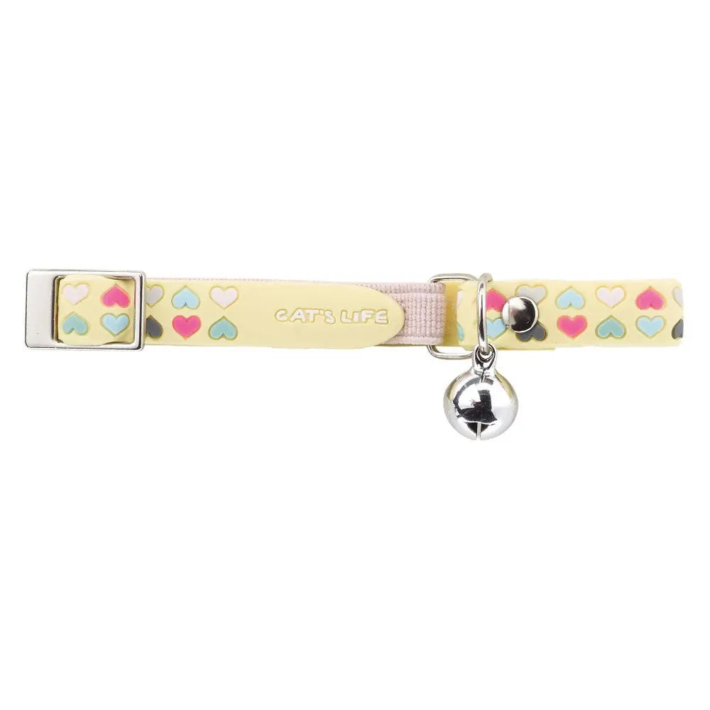 Colorful cat collar with heart patterns and a silver bell for added charm and safety.