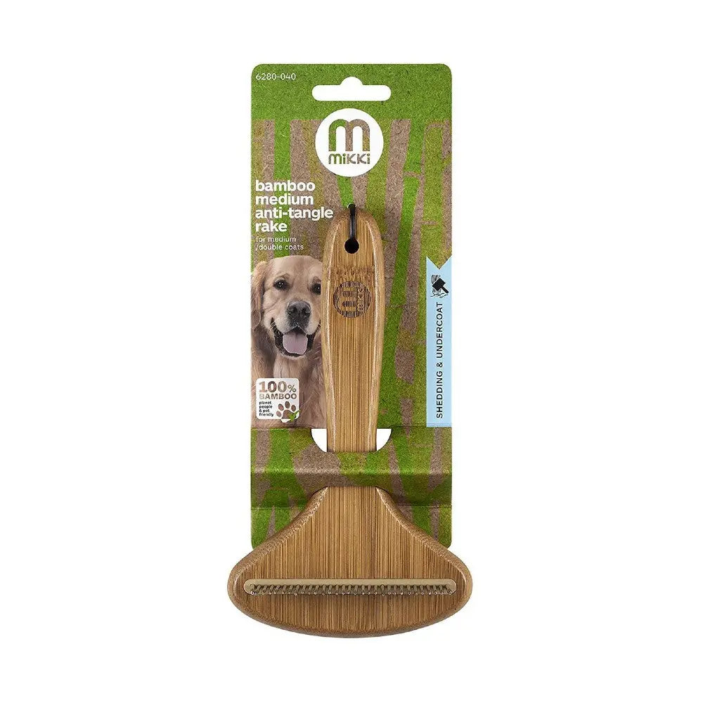 Bamboo anti-tangle rake for dogs, eco-friendly grooming tool for shedding and detangling fur.