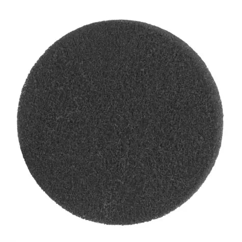 Black round cleaning sponge for effective scrubbing and surface maintenance.