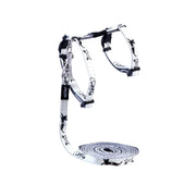 Stylish dog harness and leash set with a trendy black and white star pattern for comfortable walks.