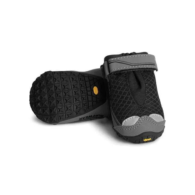 Durable dog booties with a secure strap and rugged sole for outdoor protection.