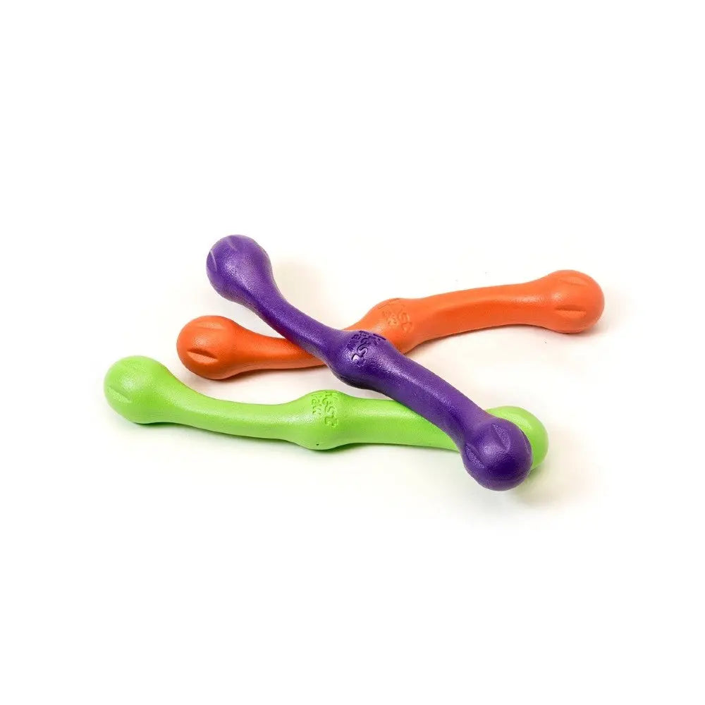 Colorful dog chew toys in green, orange, and purple for playful pet engagement.
