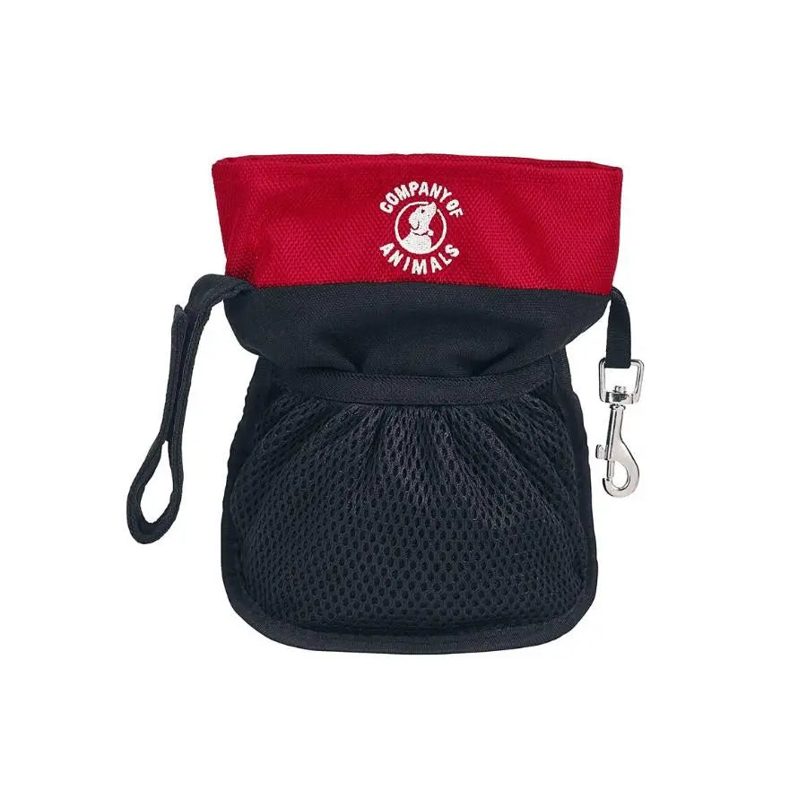 Dog treat pouch with mesh design and secure clip for easy access during training sessions.