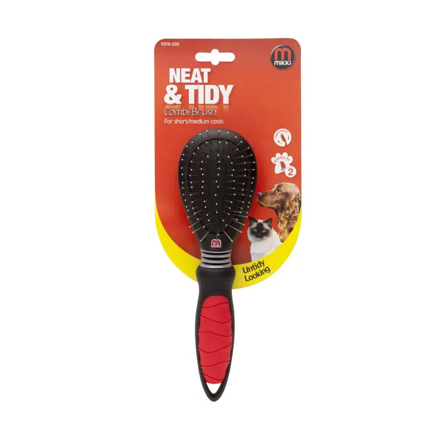 Neat & Tidy comb brush for short to medium coats, ideal for grooming pets effectively.