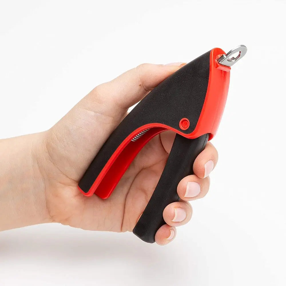 Handheld tool with a red and black grip for easy use in various tasks.