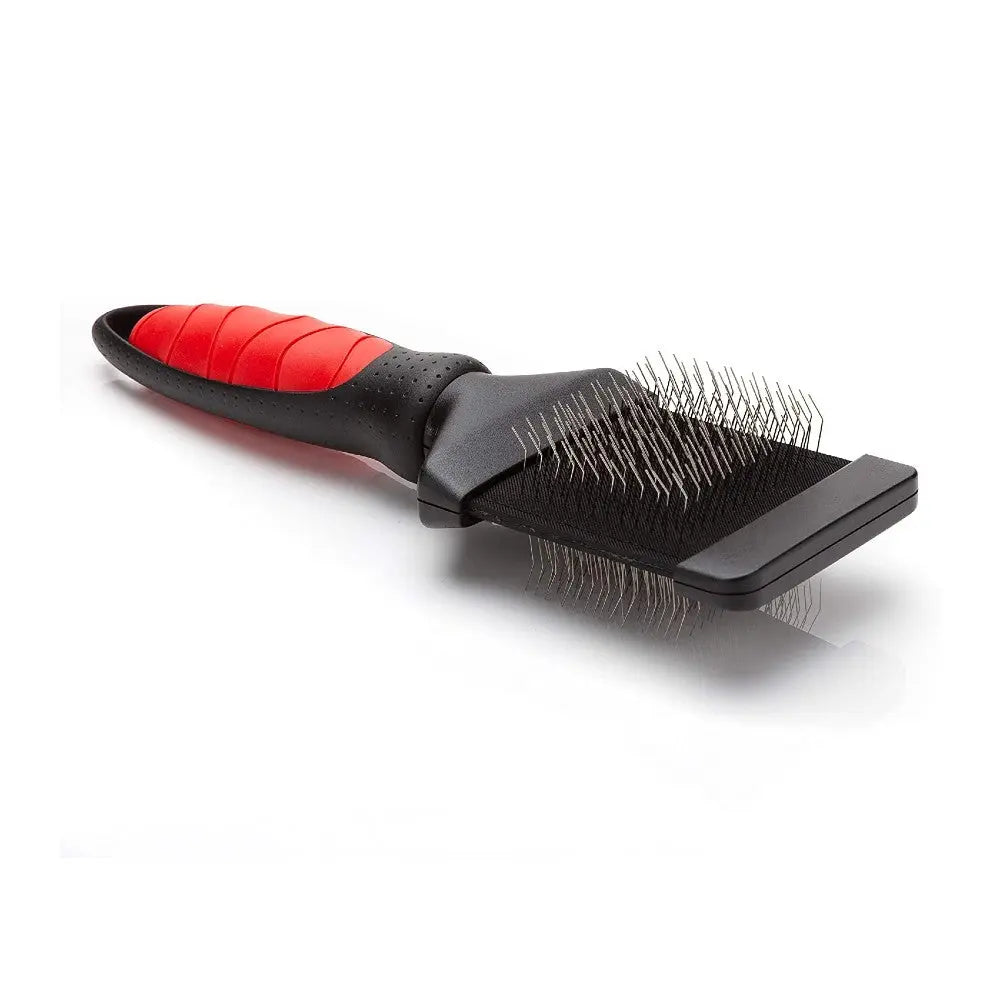 Pet grooming brush with ergonomic handle for effective fur removal and detangling.