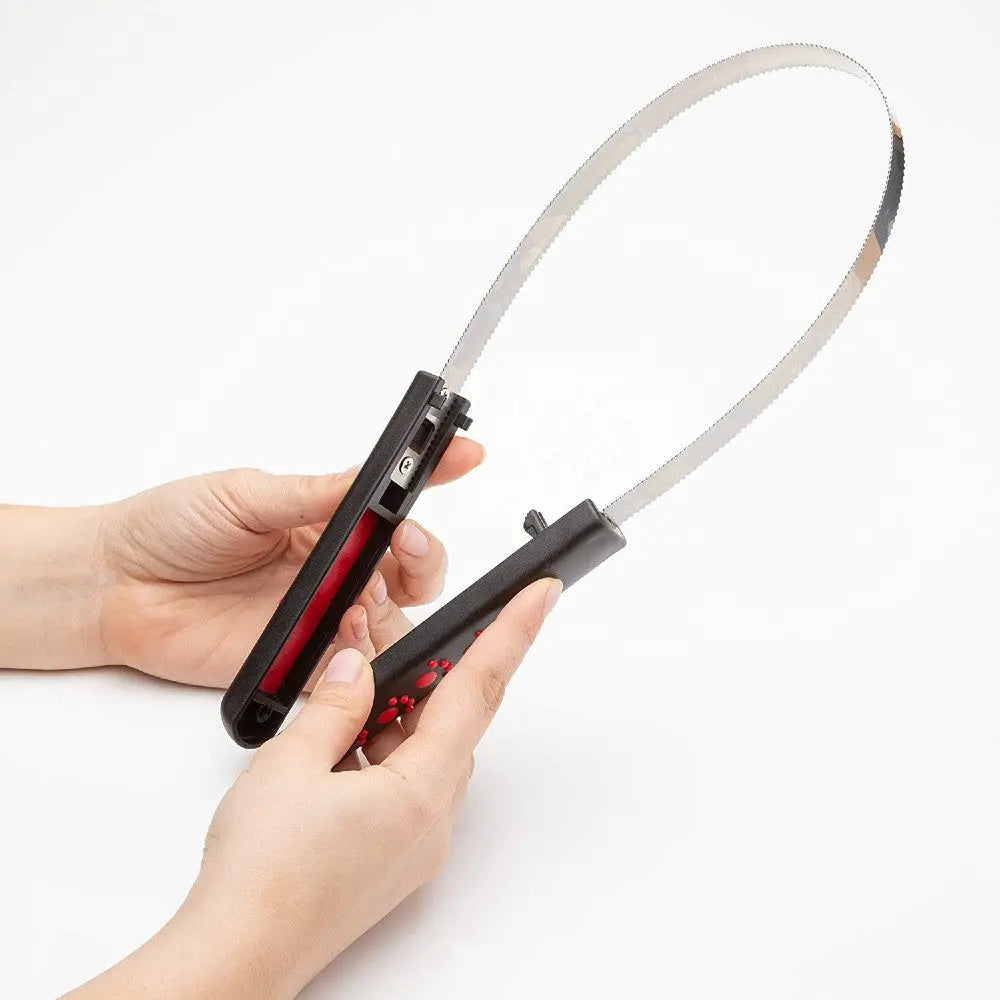 Hands holding a versatile cutting saw with a protective handle for safe use.