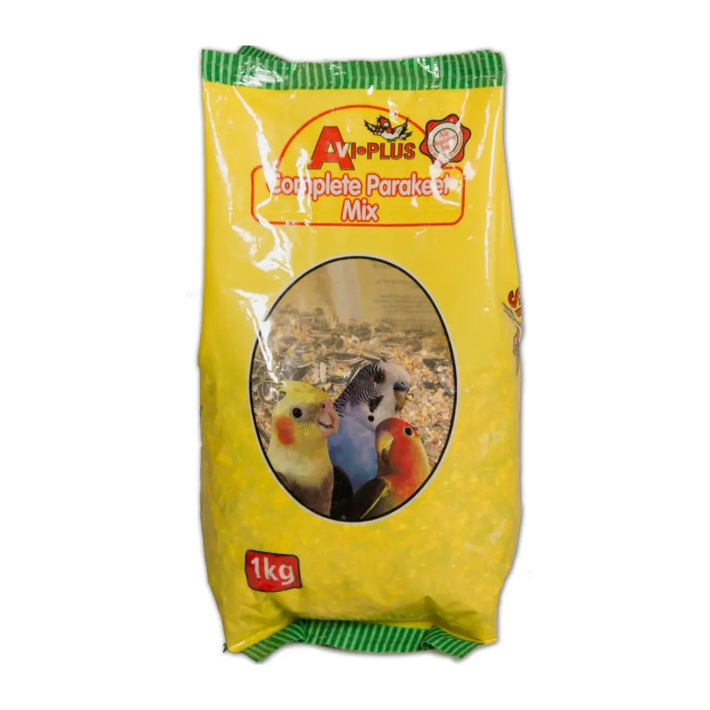 Complete parakeet mix in a 1kg bag, featuring colorful birds on the label.