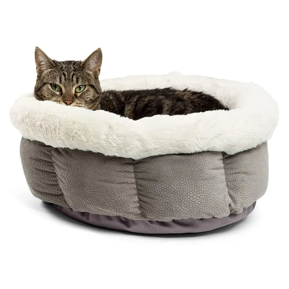 Cozy cat bed with soft lining, perfect for providing comfort and warmth to your feline friend.