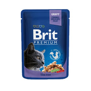 Brit Premium cat food pouch with cod fish in gravy, featuring chunks of delicate meat for a tasty meal.