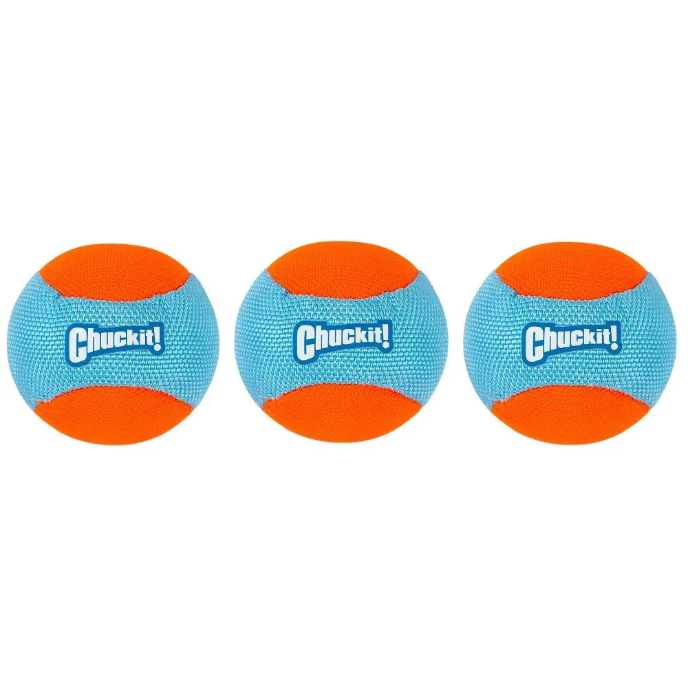 Three Chuckit! dog balls in blue and orange, perfect for outdoor play and fetch activities.