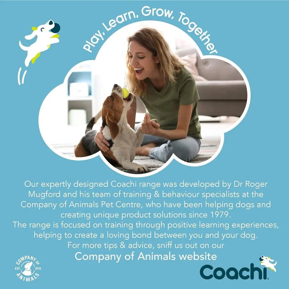 Woman training a dog with positive reinforcement, showcasing the Coachi range for effective pet training.