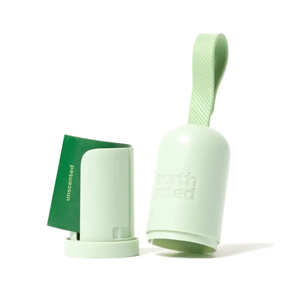 Eco-friendly dog waste bag dispenser in mint green with unscented bags for convenient clean-up.