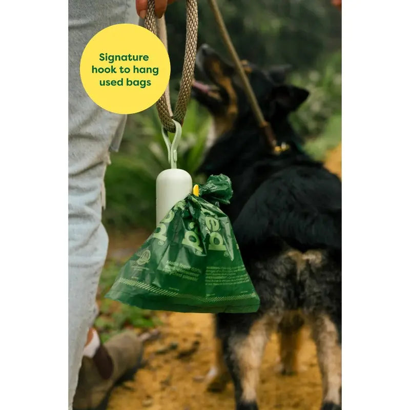 Dog waste bag holder with a signature hook for easy carrying during walks.