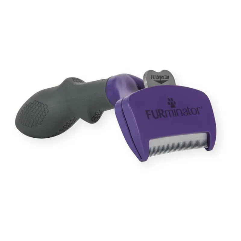 FURminator pet grooming tool for effective fur removal and shedding control.