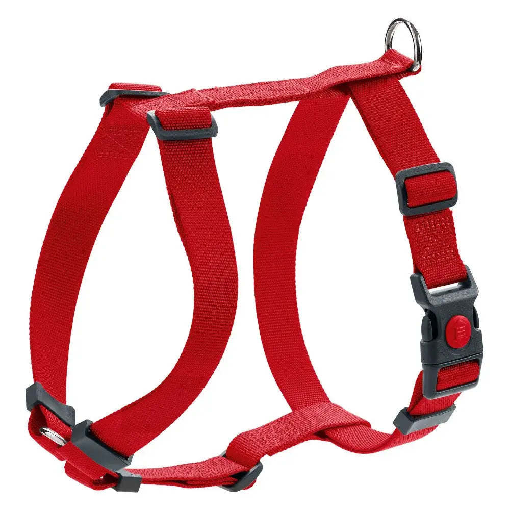 Red dog harness with adjustable straps and sturdy clips for secure and comfortable pet walking.