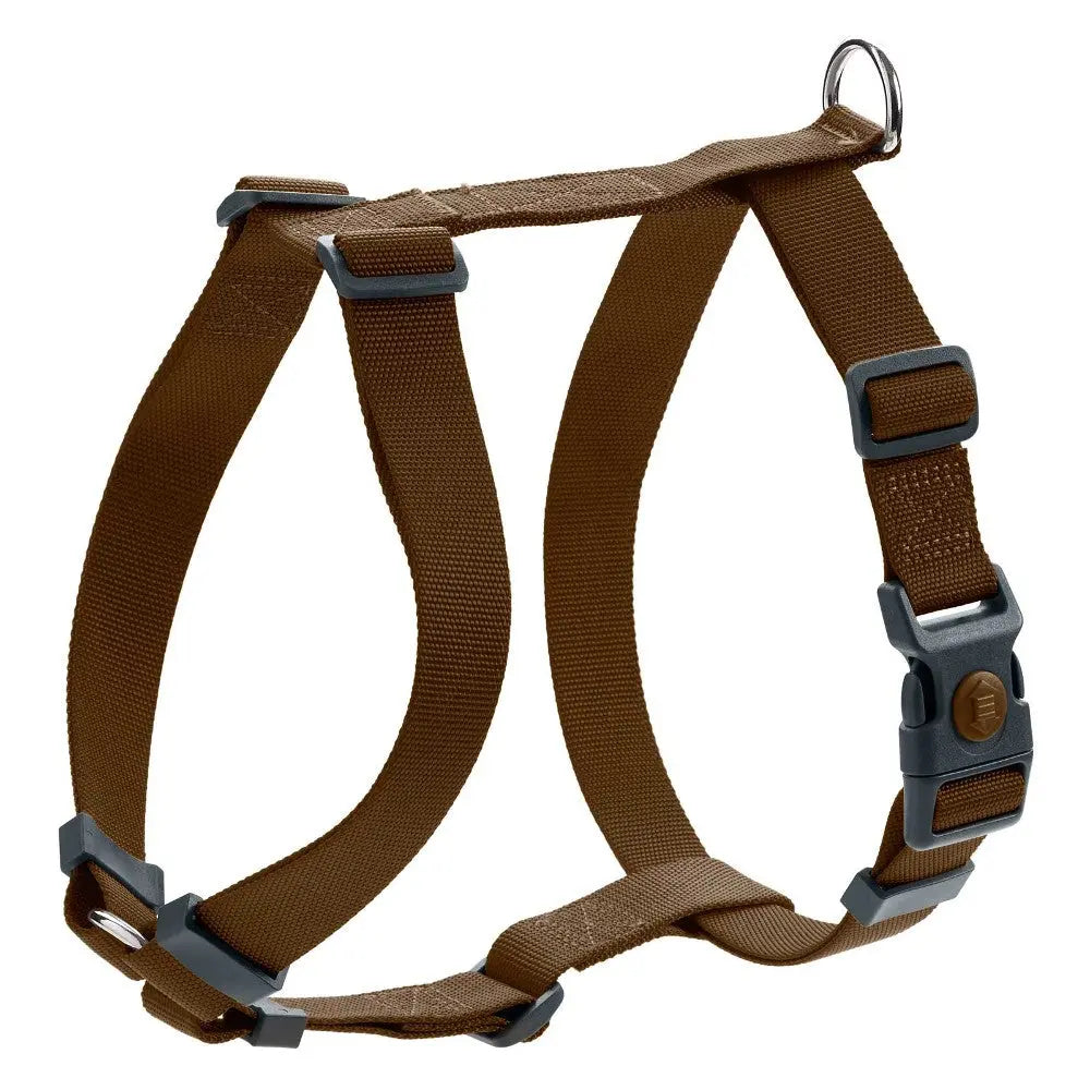 Durable brown dog harness with adjustable straps and metal D-ring for leash attachment.