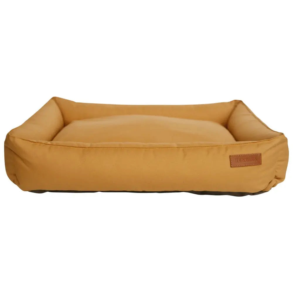Cozy mustard dog bed with a soft cushion and stylish design for pet comfort.