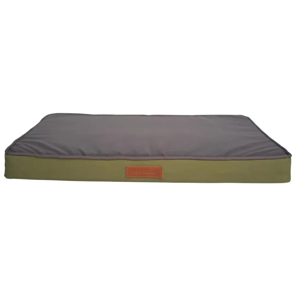 Comfortable dog bed with a gray top and olive green base for restful pet sleep.