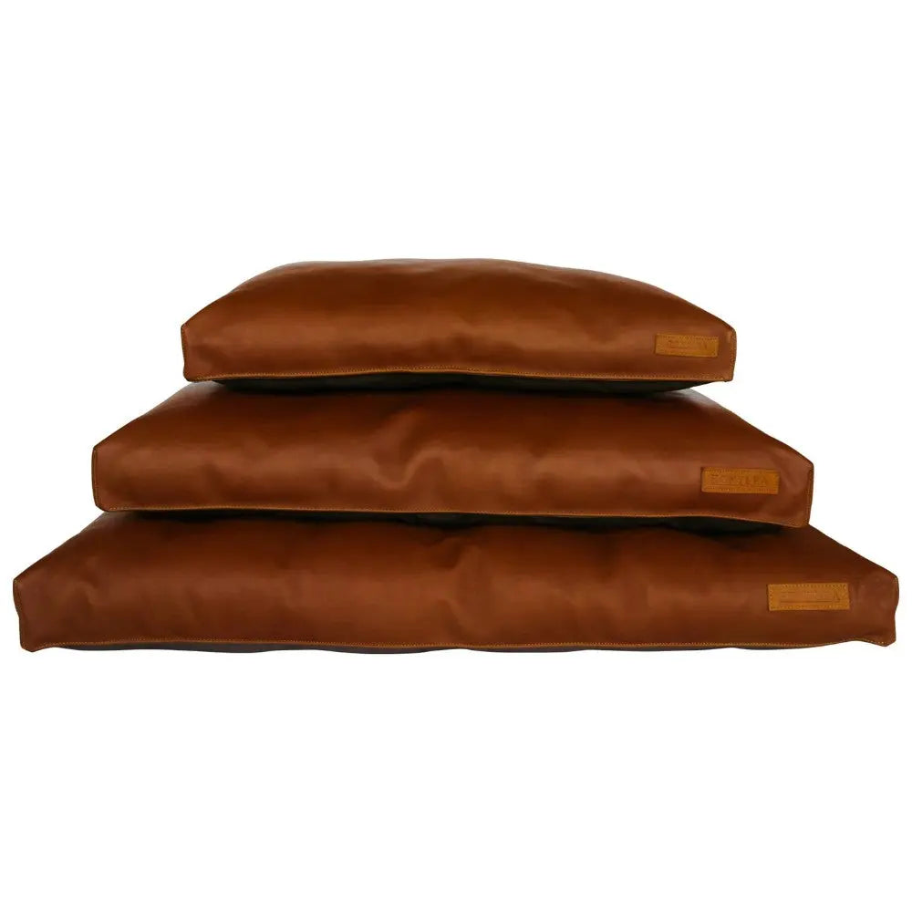 Stacked brown dog beds with a sleek design for comfort and style.