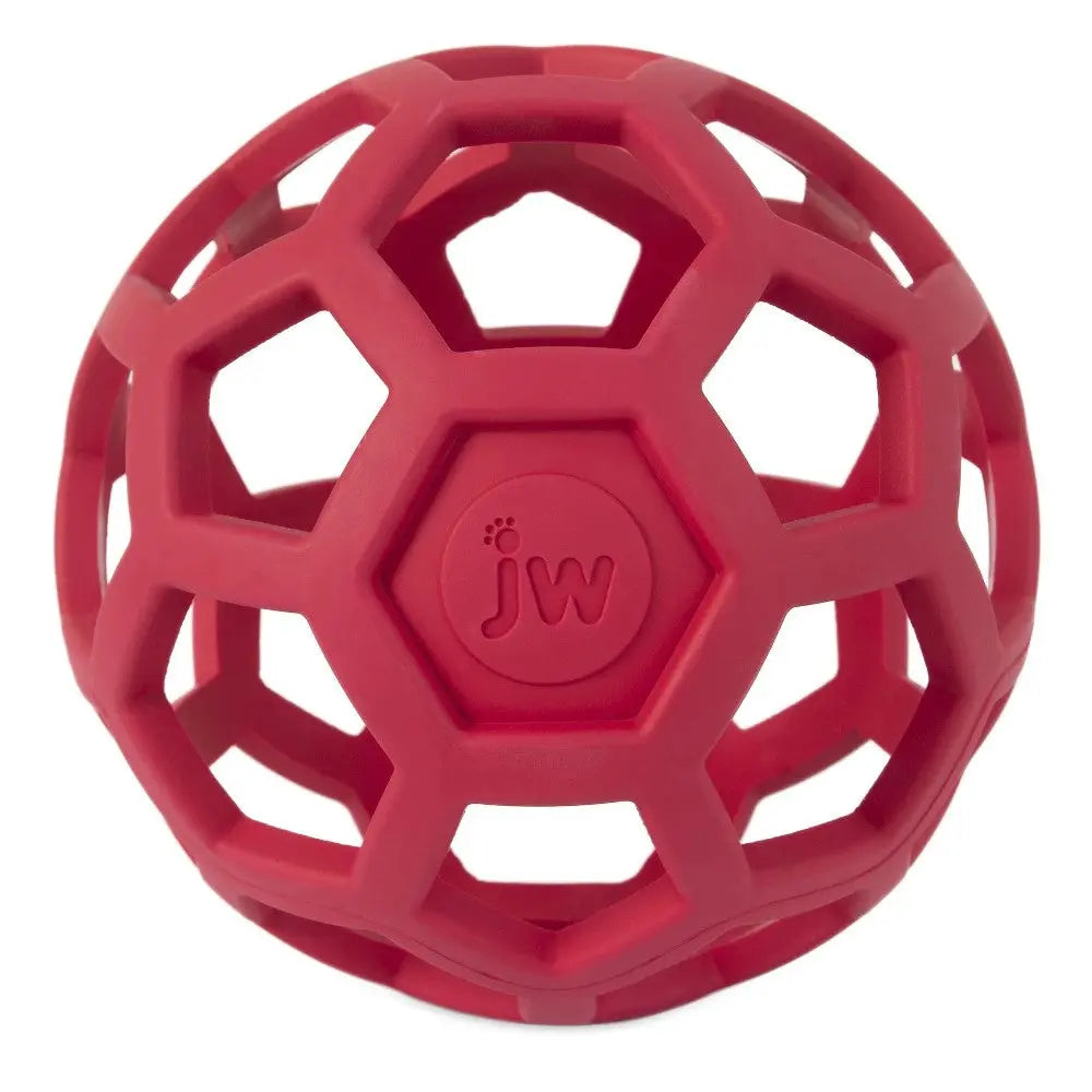 Red dog toy ball with a honeycomb design for interactive play and chewing.