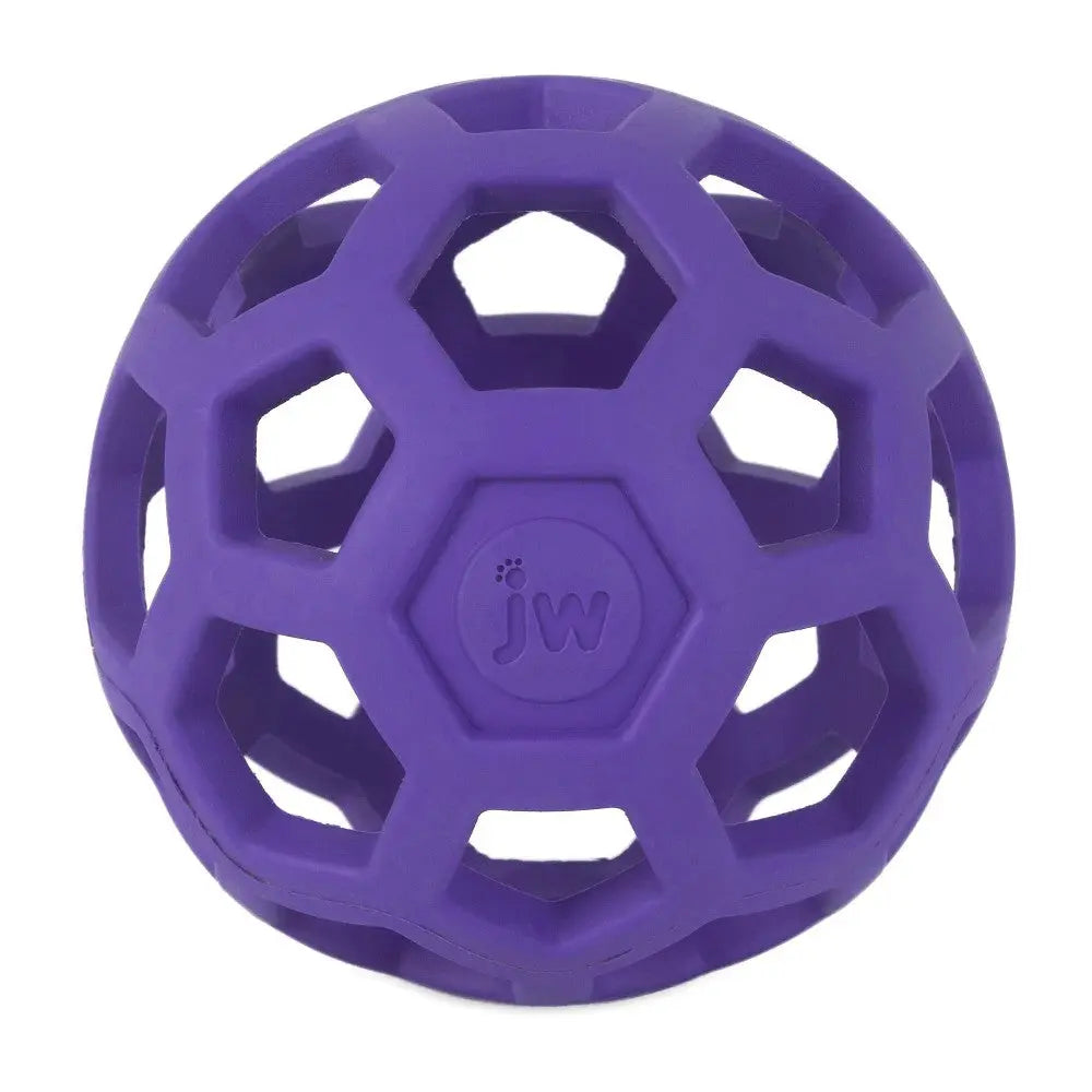 Purple rubber dog toy with a honeycomb design for interactive play and chewing.