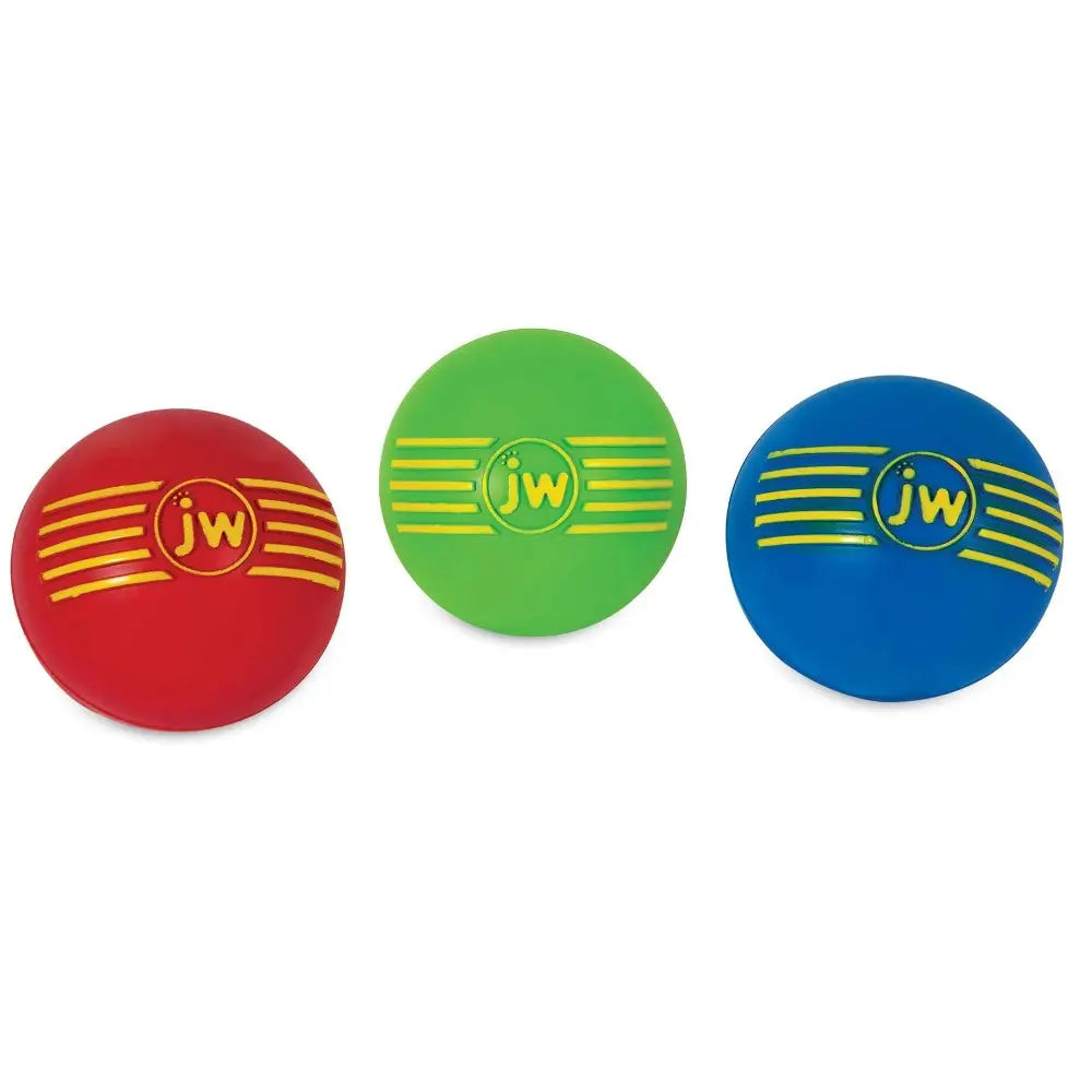 Colorful JW pet balls in red, green, and blue for fun and interactive playtime with your dog.