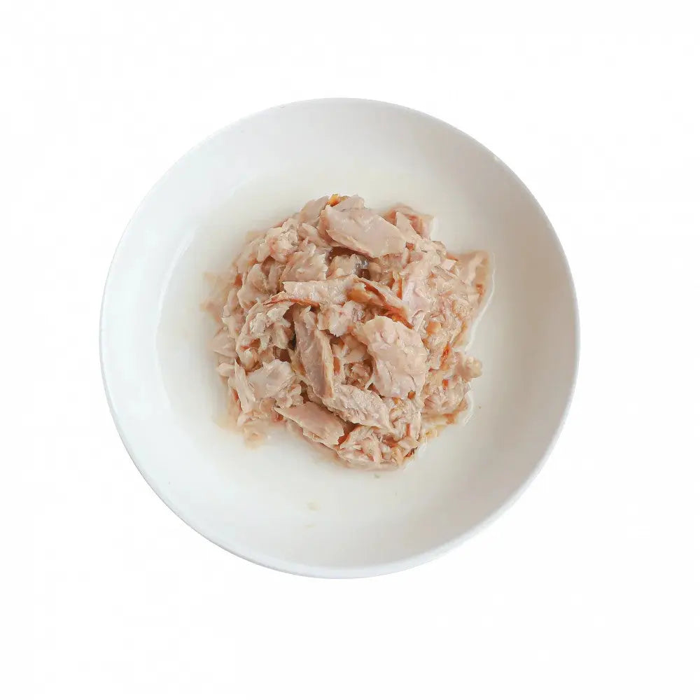 Shredded chicken in a white bowl, perfect for meal prep or pet food.