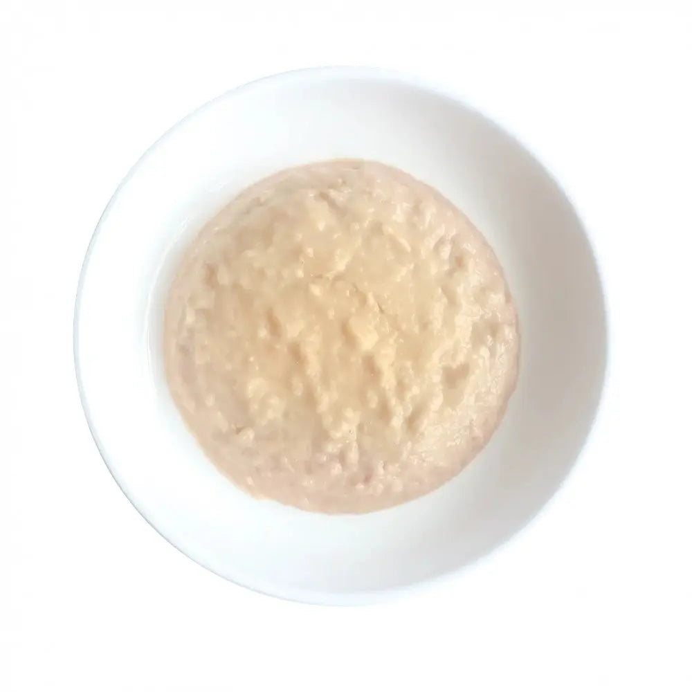 Creamy oatmeal served in a white bowl, perfect for a healthy breakfast option.