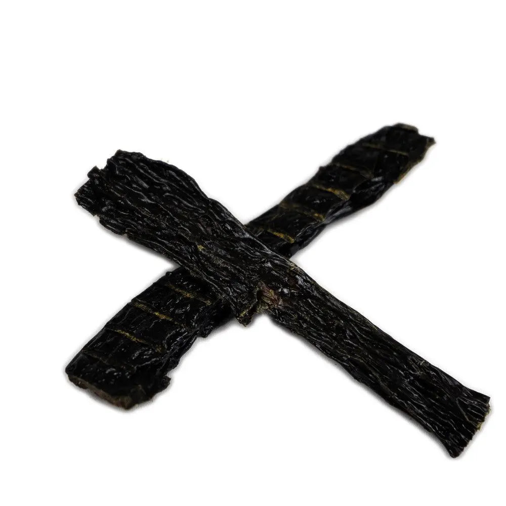 Dried seaweed strips arranged in a cross, perfect for healthy snacking or culinary use.